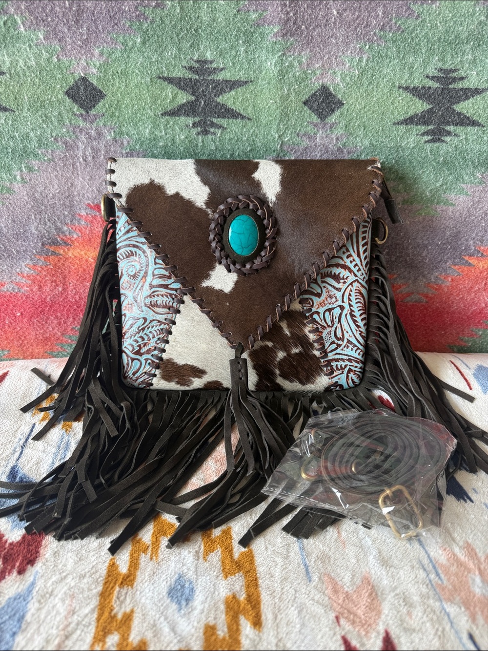 Handcrafted Brown Cowhide Fringe Crossbody Bag with Turquoise Accent